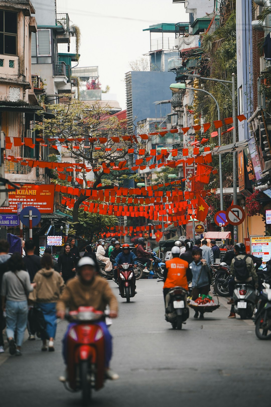 Hanoi street decorated with Vietnamese flags