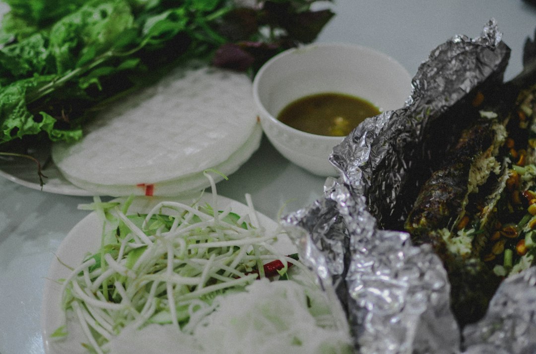 Vietnamese fish dish served with herbs
